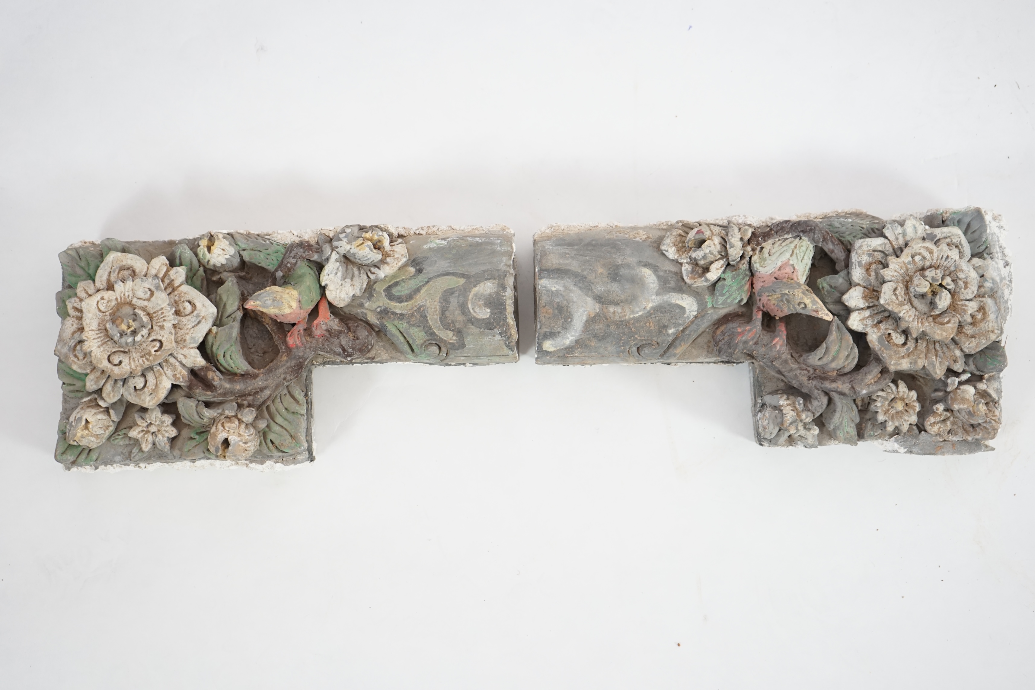 A pair of Chinese painted pottery ‘Birds & Blossoms’ tiles, Ming Dynasty (1368-1644)